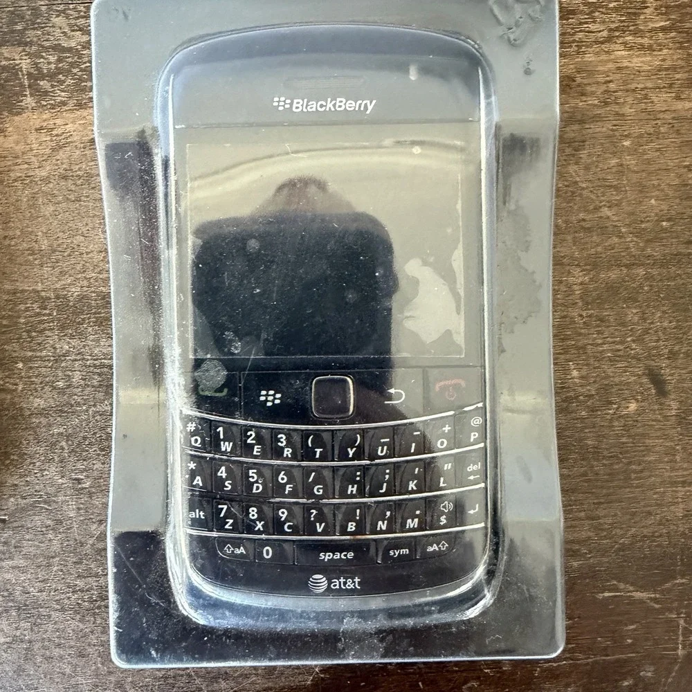 Vintage Tech Lot: Working Kindle 4, Locked iPhone 5, Untested BlackBerry 9700